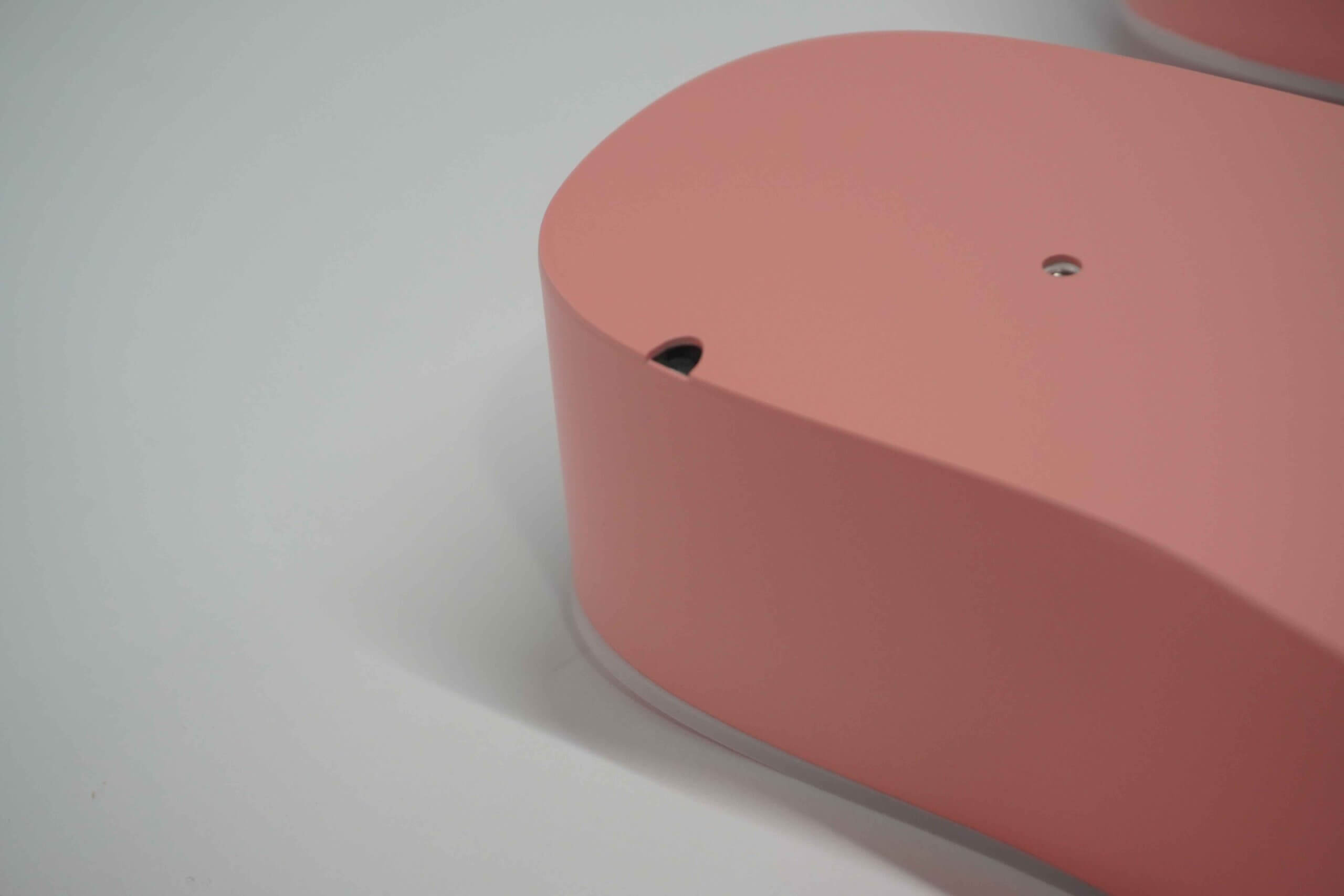 Close-up of a precision-drilled weep hole on a custom outdoor led sign for drainage and thermal ventilation.