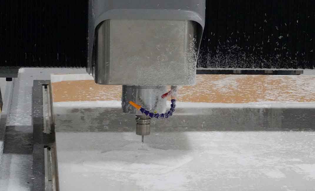 Detailed view of professional laser cutting services in a modern factory, showing precision metal fabrication and industrial manufacturing.