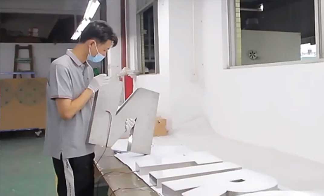 Detailed view of professional laser cutting services in a modern factory, showing precision metal fabrication and industrial manufacturing.