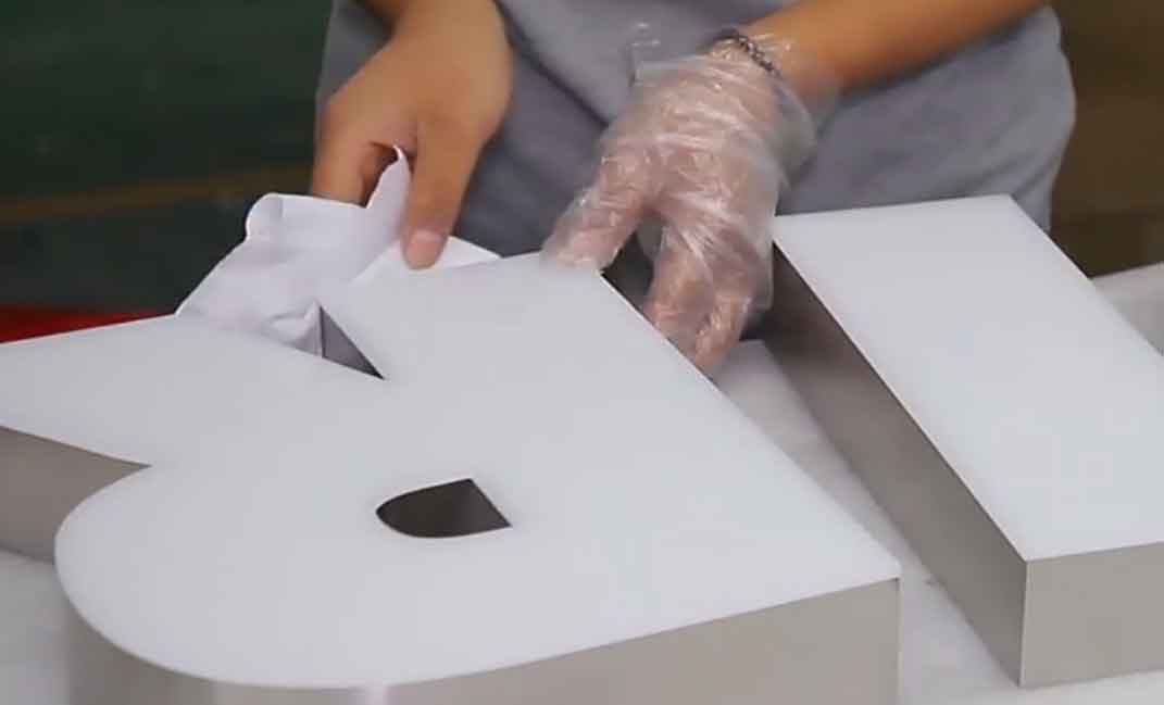 Detailed view of professional laser cutting services in a modern factory, showing precision metal fabrication and industrial manufacturing.