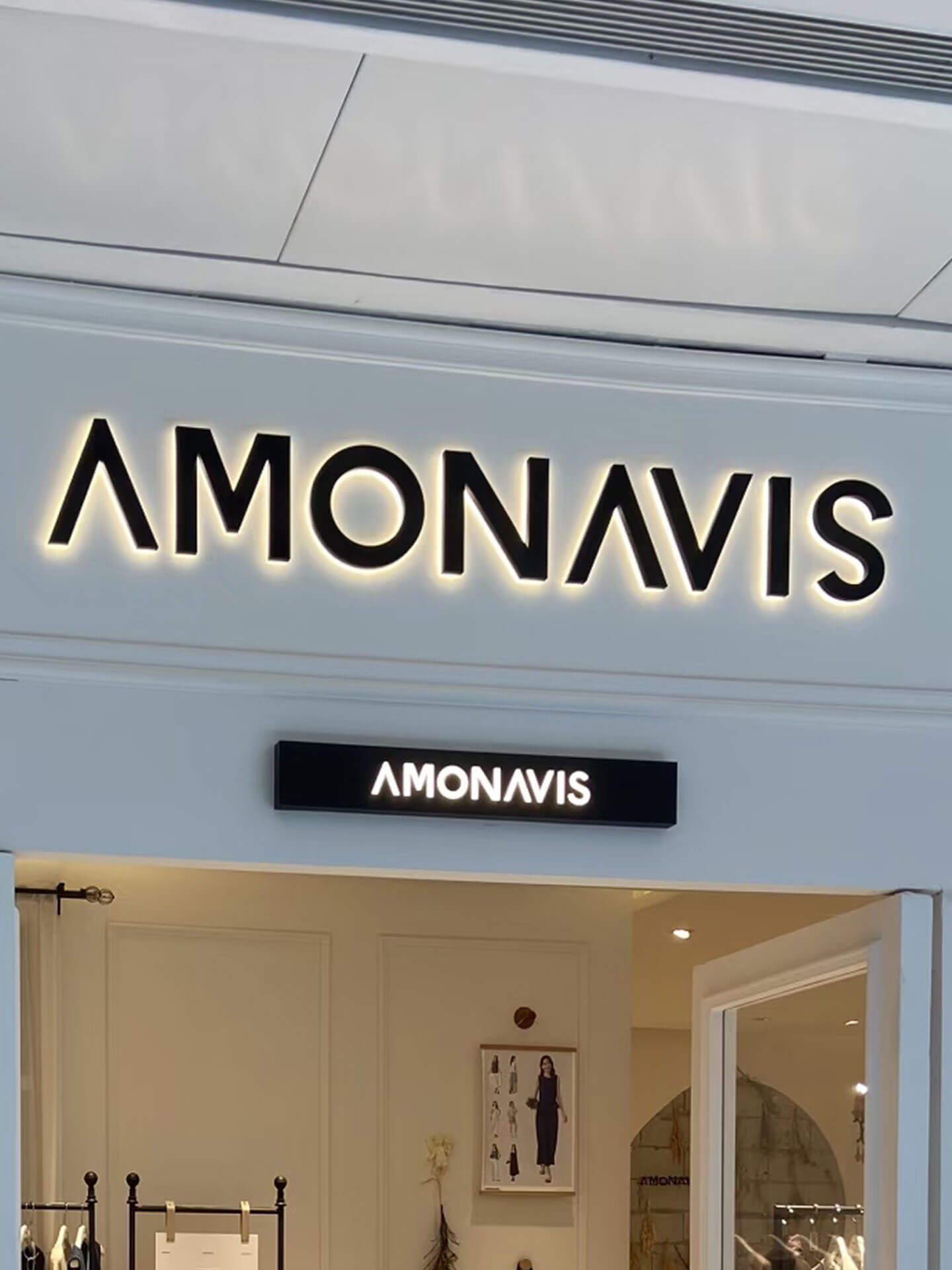 Custom outdoor projecting light box sign, featuring a minimalist and modern commercial design.