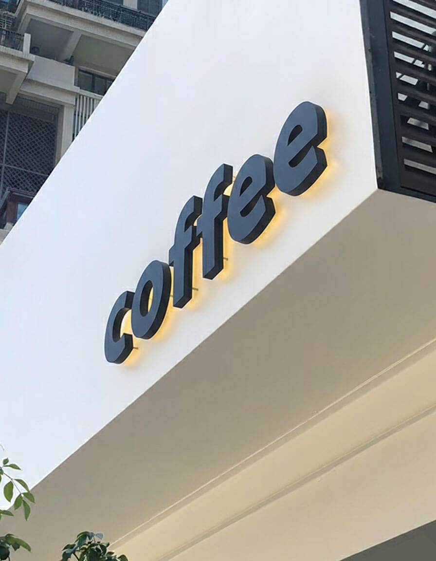 Custom outdoor LED channel letters for 'The Chef's Table' restaurant, featuring IP67 waterproofing that ensures high-visibility and stable operation during heavy rain.