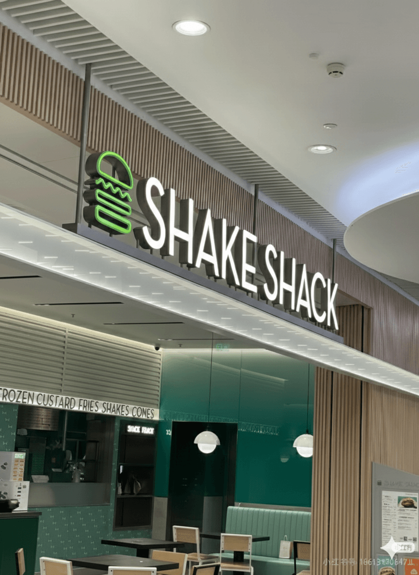 Custom outdoor projecting light box sign, featuring a minimalist and modern commercial design.