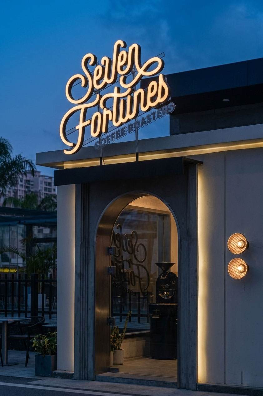 Warm-toned illuminated signage for a coffee shop, crafted with precision acrylic techniques.