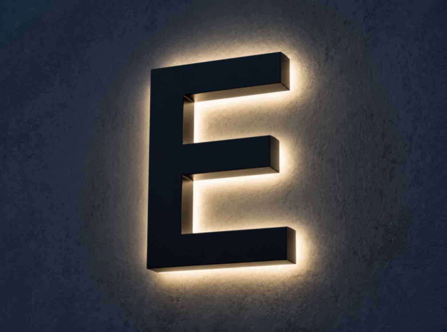 Custom LED Channel Letters 2 Custom premium RGB channel letters with programmable LED lighting for the Ninja Social Club storefront signage