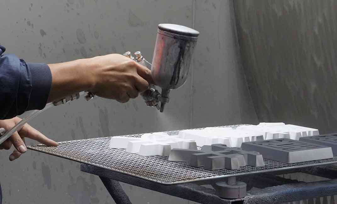 Capabilities 5 Detailed view of professional laser cutting services in a modern factory, showing precision metal fabrication and industrial manufacturing.