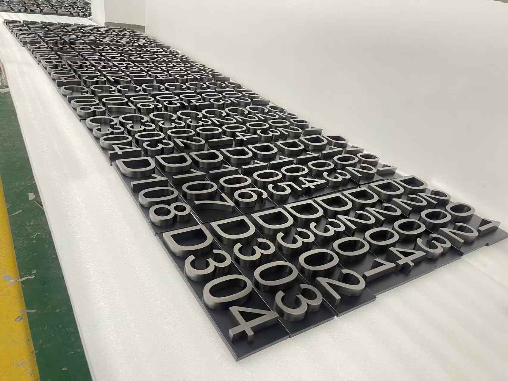 Bulk signage production supporting signage lead time production capacity for brand rollouts