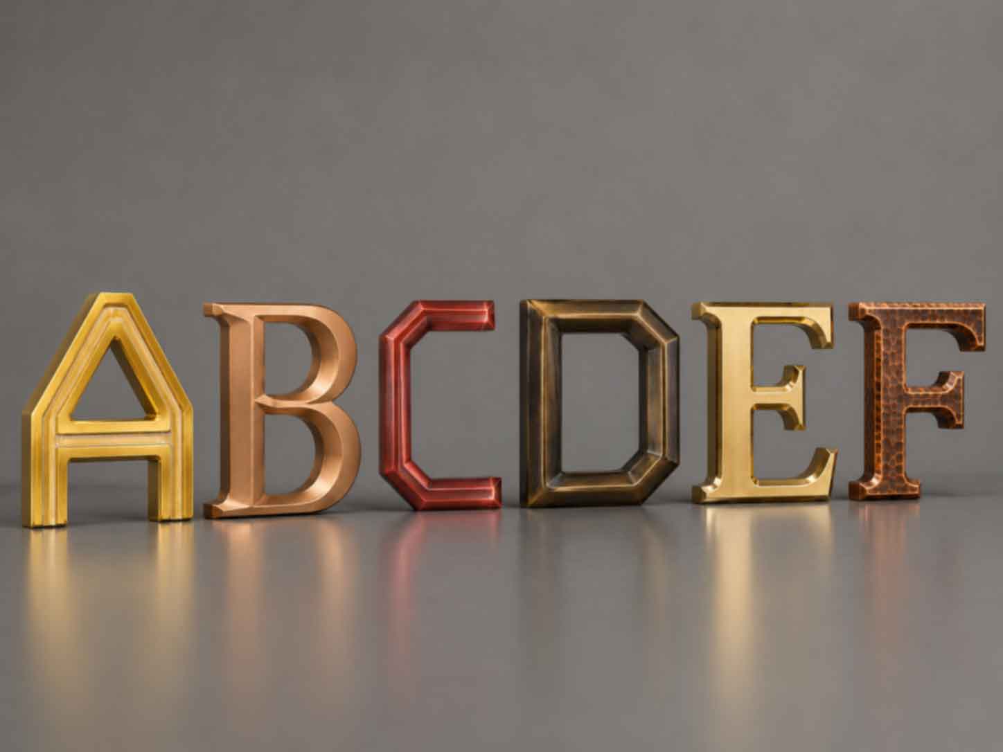 Custom Non Illuminated Letters made from aluminum with gold copper bronze and brushed finishes