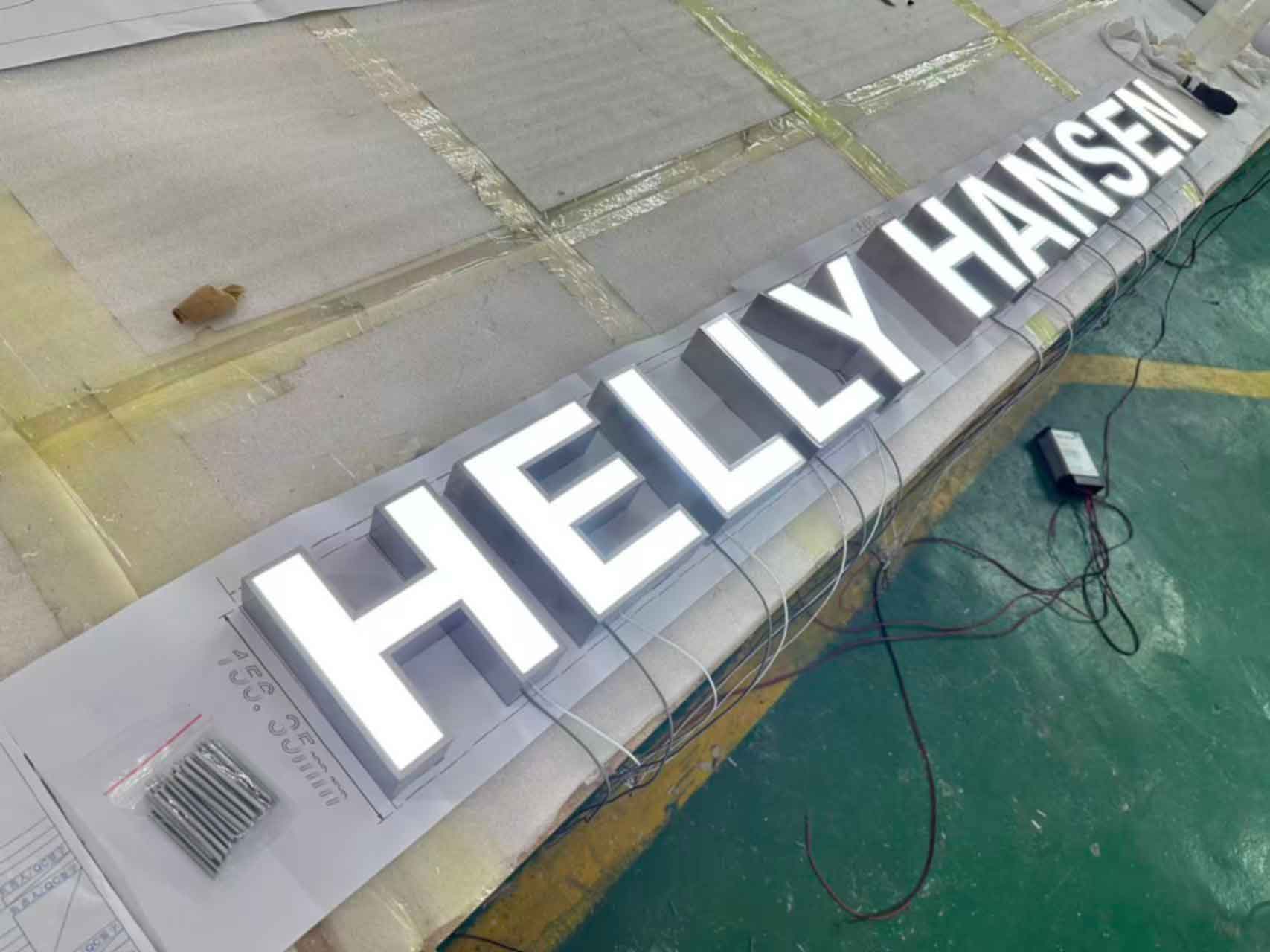 Outdoor Front Lit Channel Letters signage manufactured for a shopping center.