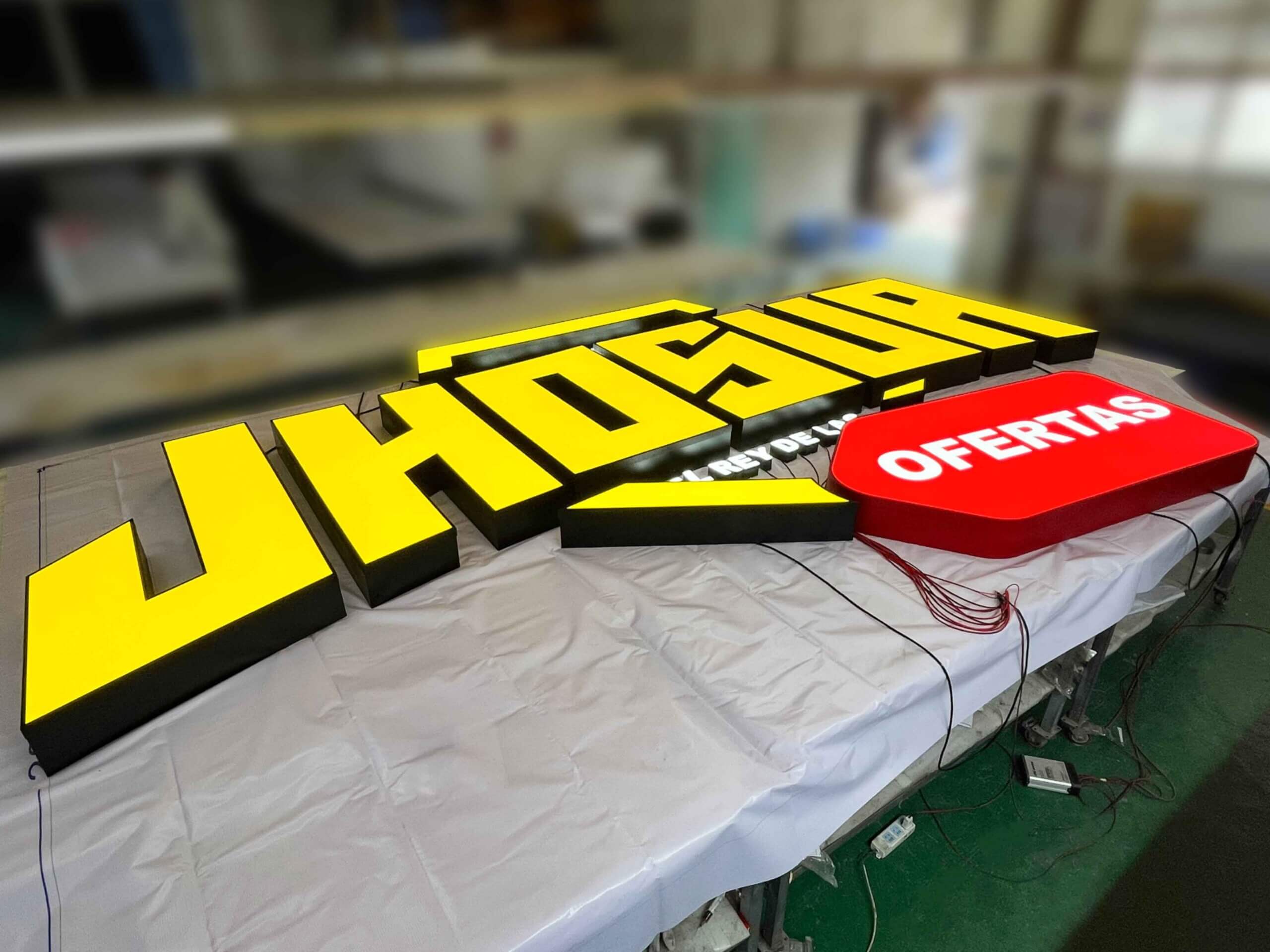 Large Front Lit Channel Letters signage installed on a commercial building facade.