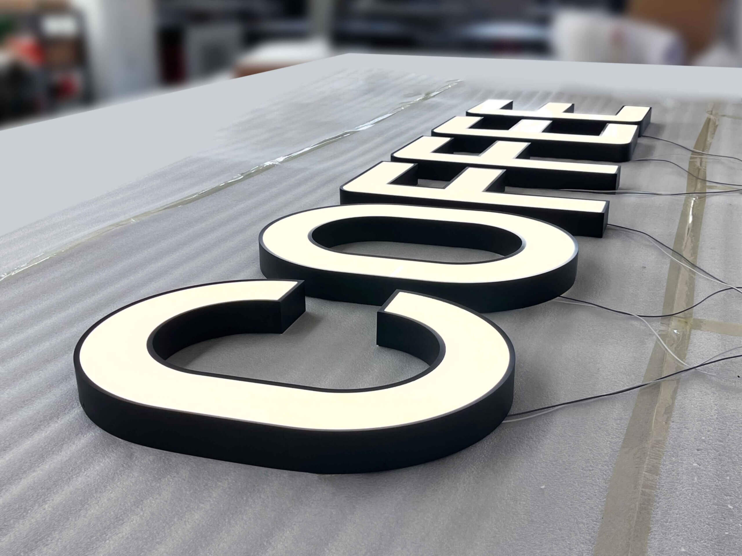Front Lit Channel Letters with stainless steel returns and acrylic faces for retail branding.